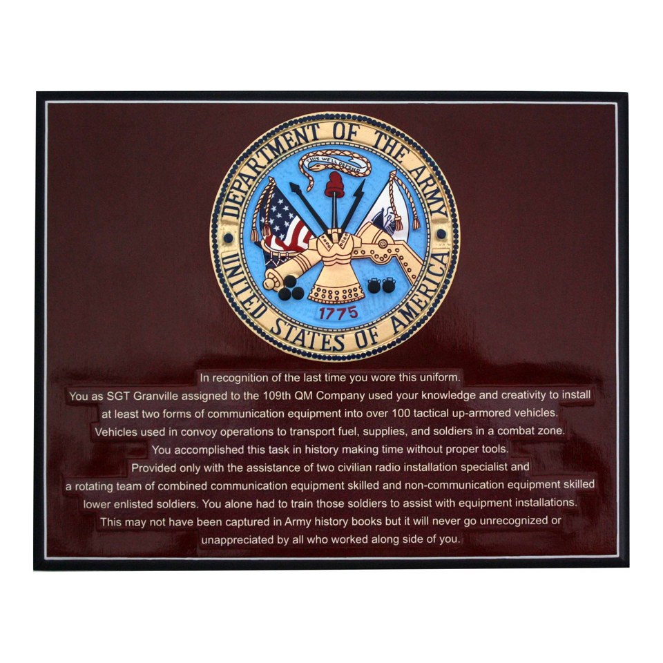 Rectangular wood presentation plaque with a United States Army seal above a dedication inscription.