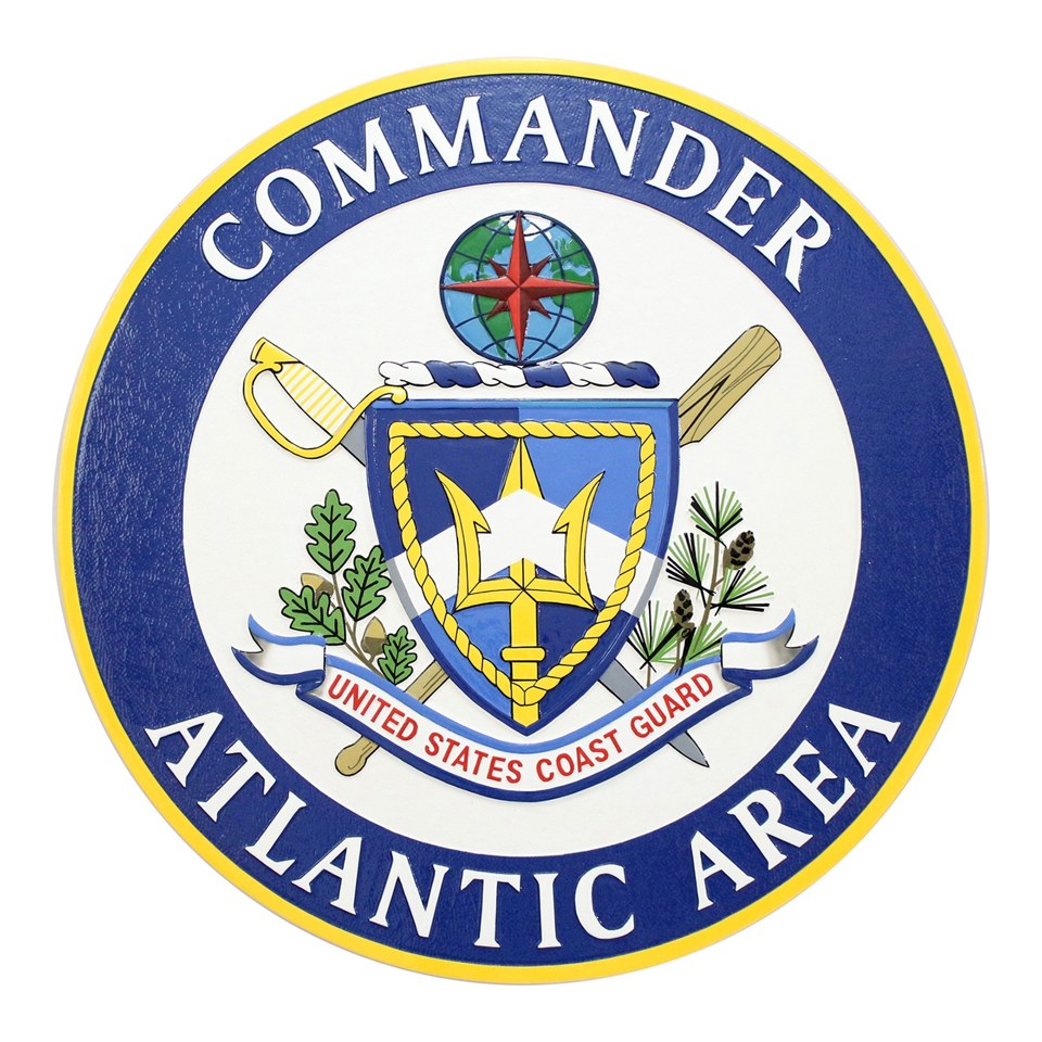 Oval Commander Atlantic Area Coast Guard plaque with a central shield, crossed anchors and gold border.