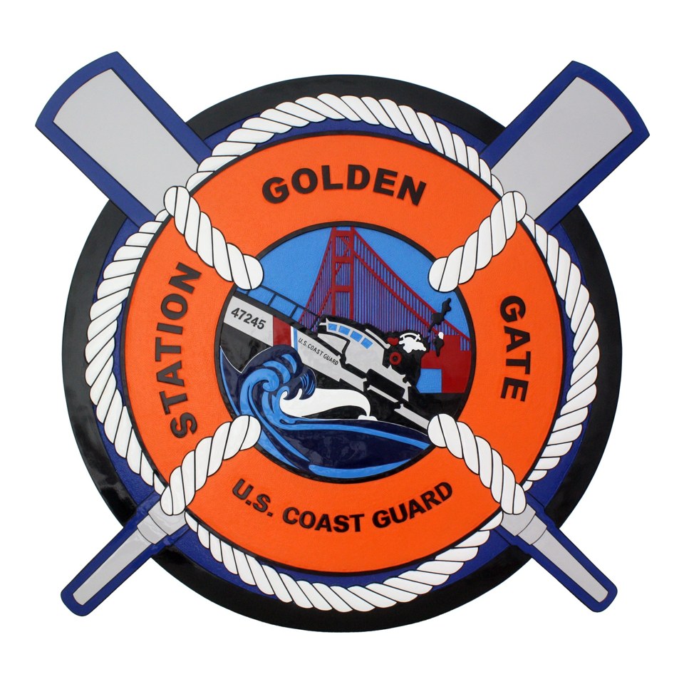 Coast Guard Station Golden Gate plaque featuring a life ring, crossed oars, boat and bridge.