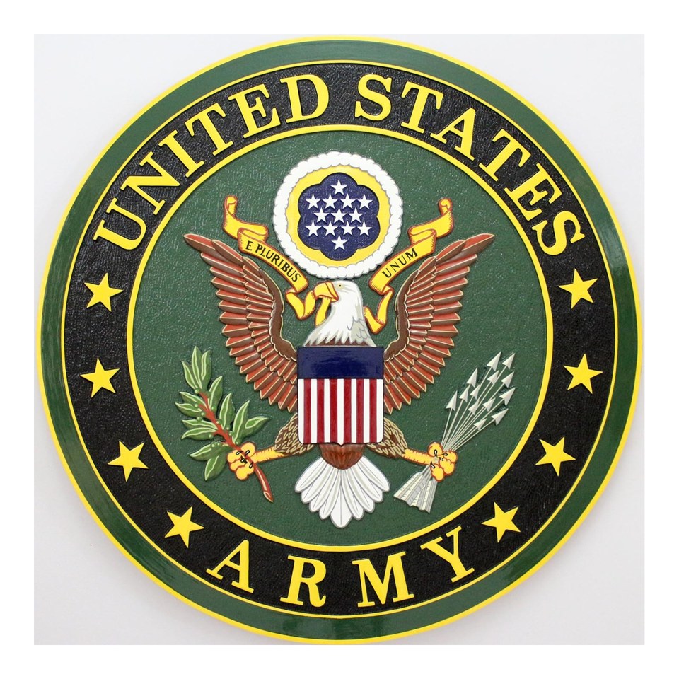 Round United States Army seal plaque with an eagle, flags and gold lettering on a black field.